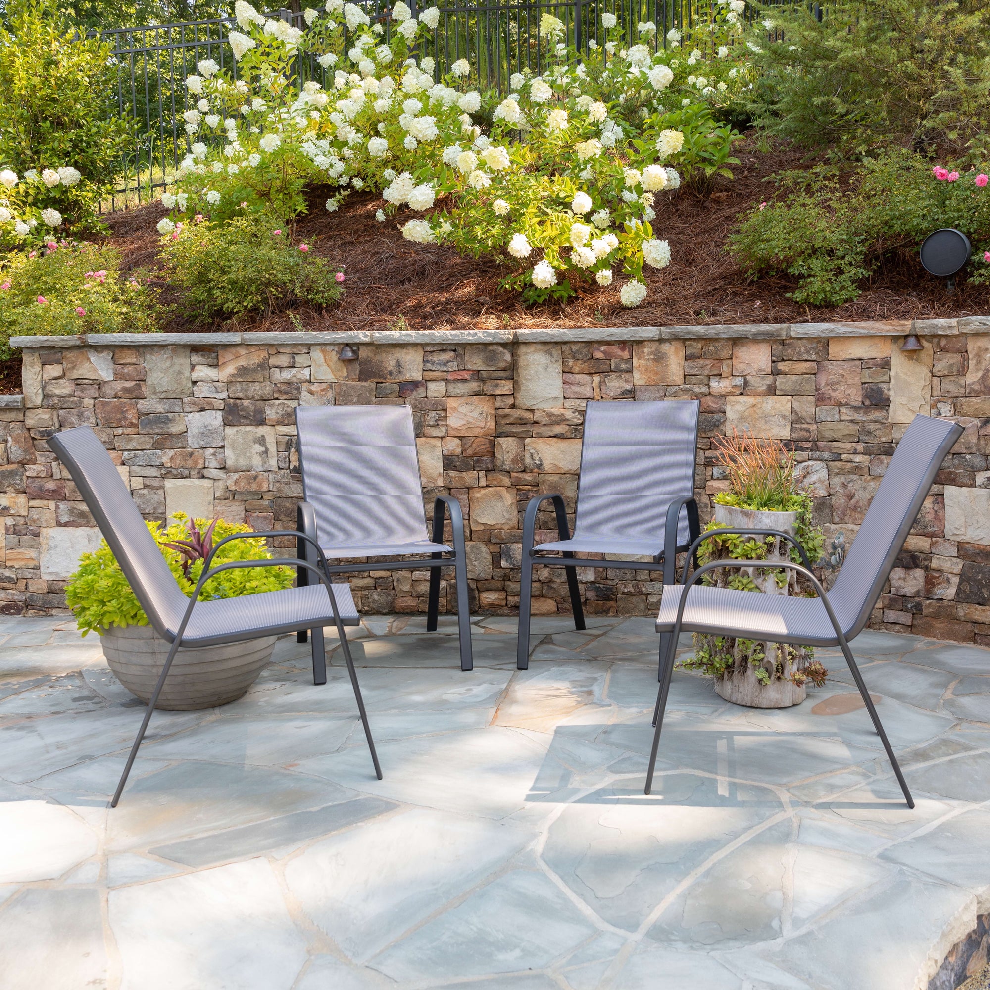 https://i5.walmartimages.com/seo/BizChair-4-Pack-Gray-Outdoor-Stack-Chair-with-Flex-Comfort-Material-and-Metal-Frame_590b844c-4d85-414c-a795-878f27c50f93.4c0294dcefaab84c6b65a9037cf29fb3.jpeg